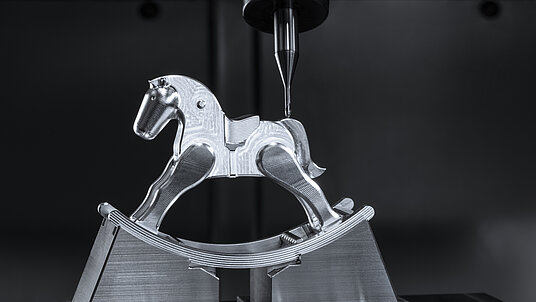 Machining a rocking horse on the HERMLE C 12 machining center.